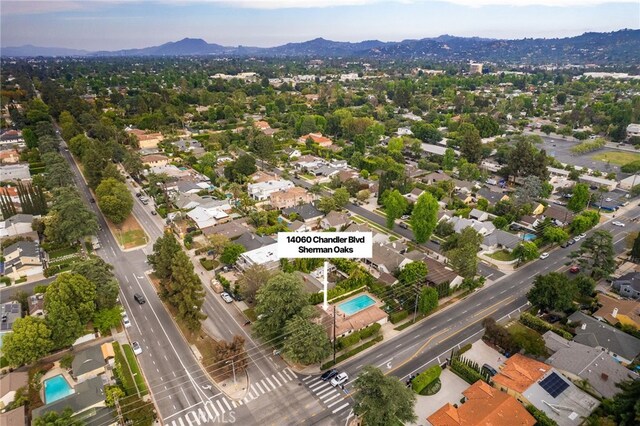 14060 Chandler Blvd, Sherman Oaks, CA 91401 - aerial view of property's location with a mountainous background and nearby suburban area