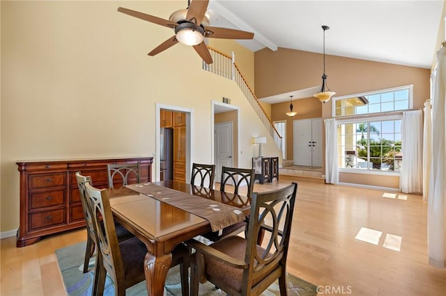 33087 Corte Ganso, Temecula, CA 92592 - dining room with high vaulted ceiling, light wood-type flooring, a ceiling fan, beam ceiling, and stairway