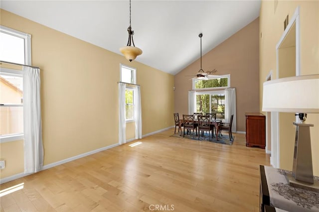 33087 Corte Ganso, Temecula, CA 92592 - dining space with light wood-style floors, high vaulted ceiling, healthy amount of natural light, and a ceiling fan