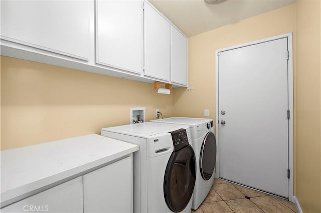 33087 Corte Ganso, Temecula, CA 92592 - washroom featuring cabinet space, washer and clothes dryer, and light tile patterned floors