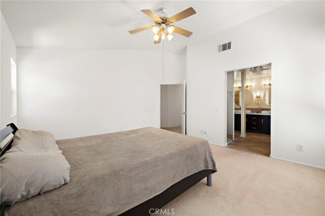 33087 Corte Ganso, Temecula, CA 92592 - bedroom with light carpet, ensuite bathroom, ceiling fan, and vaulted ceiling