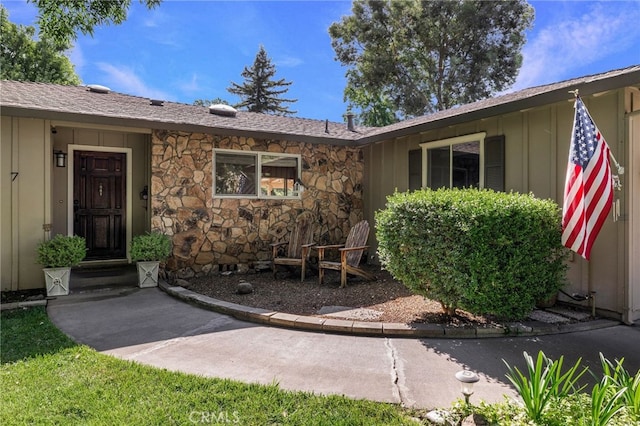 7 Calgary Ln, Chico, CA 95926 - property entrance with stone siding and board and batten siding