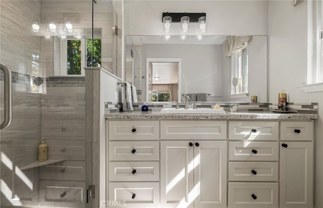 7 Calgary Ln, Chico, CA 95926 - bathroom featuring a shower stall, vanity, and plenty of natural light