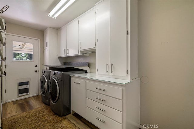 7 Calgary Ln, Chico, CA 95926 - laundry area featuring washing machine and clothes dryer, cabinet space, and dark wood-style flooring