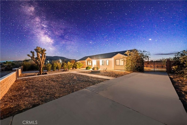 62290 Crestview Dr, Joshua Tree, CA 92252 - view of front of home featuring a gate and stucco siding