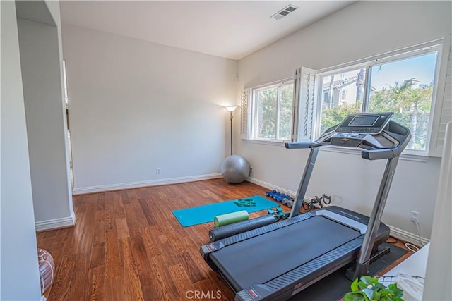 26511 Brooks Cir, Stevenson Ranch, CA 91381 - workout area with wood finished floors and baseboards