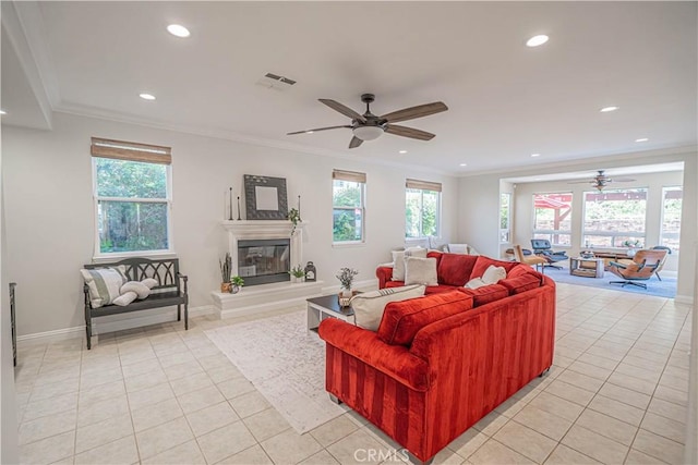 26511 Brooks Cir, Stevenson Ranch, CA 91381 - living room with a ceiling fan, light tile patterned flooring, recessed lighting, plenty of natural light, and a glass covered fireplace