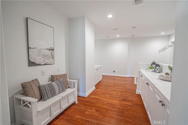 26511 Brooks Cir, Stevenson Ranch, CA 91381 - hall featuring light wood-style floors and recessed lighting