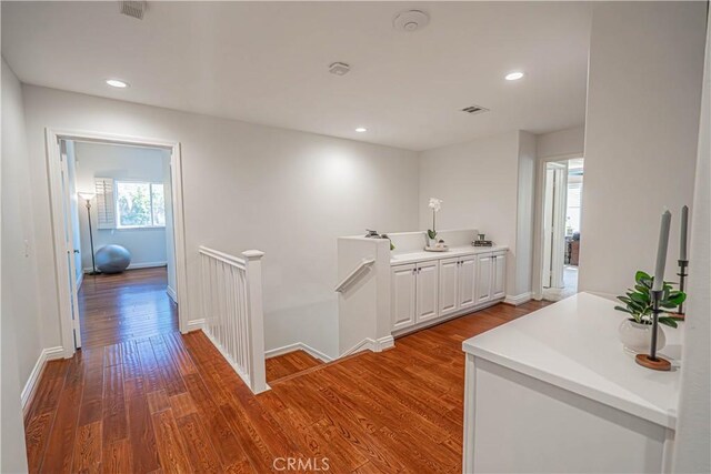 26511 Brooks Cir, Stevenson Ranch, CA 91381 - hallway featuring an upstairs landing, wood finished floors, and recessed lighting