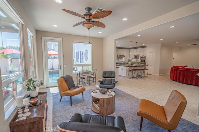 26511 Brooks Cir, Stevenson Ranch, CA 91381 - living room with plenty of natural light, ceiling fan, and recessed lighting