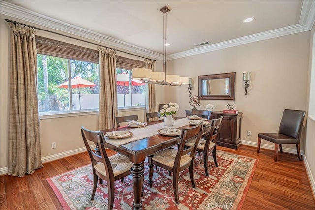 26511 Brooks Cir, Stevenson Ranch, CA 91381 - dining space with wood finished floors, crown molding, and recessed lighting