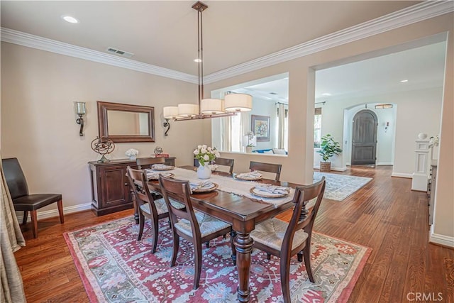 26511 Brooks Cir, Stevenson Ranch, CA 91381 - dining area with wood finished floors, crown molding, a chandelier, and recessed lighting