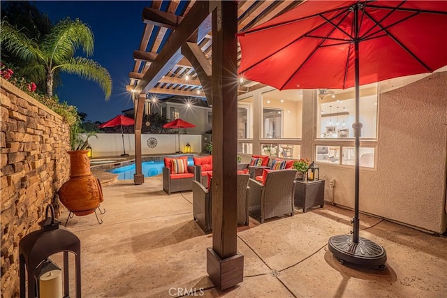 26511 Brooks Cir, Stevenson Ranch, CA 91381 - patio at night with a pergola, a patio, an outdoor living space, and a fenced backyard