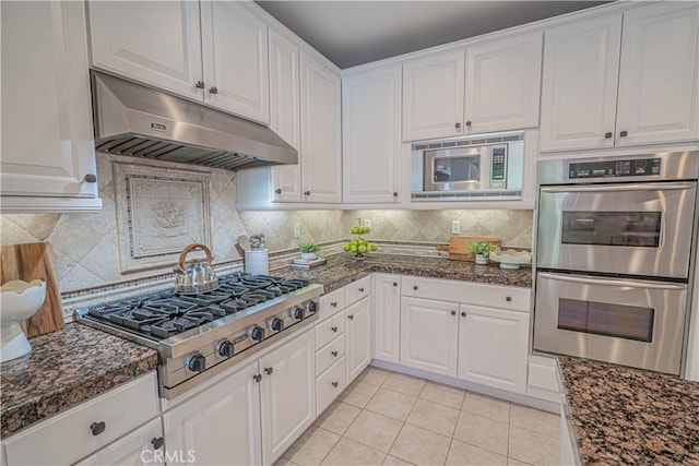 26511 Brooks Cir, Stevenson Ranch, CA 91381 - kitchen featuring appliances with stainless steel finishes, under cabinet range hood, and white cabinets