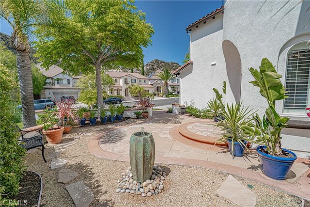 26511 Brooks Cir, Stevenson Ranch, CA 91381 - view of yard with a patio area and a residential view