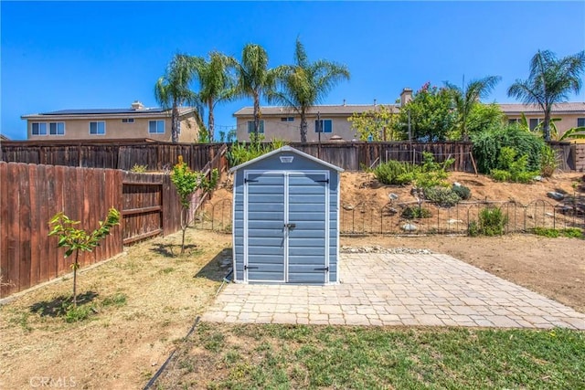 26490 Mapleridge Way, Moreno Valley, CA 92555 - fenced backyard with a storage unit and a patio