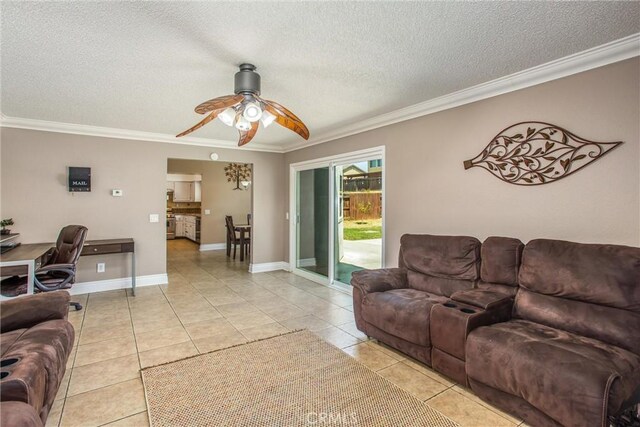 26490 Mapleridge Way, Moreno Valley, CA 92555 - living area with ceiling fan, ornamental molding, light tile patterned floors, a textured ceiling, and a desk