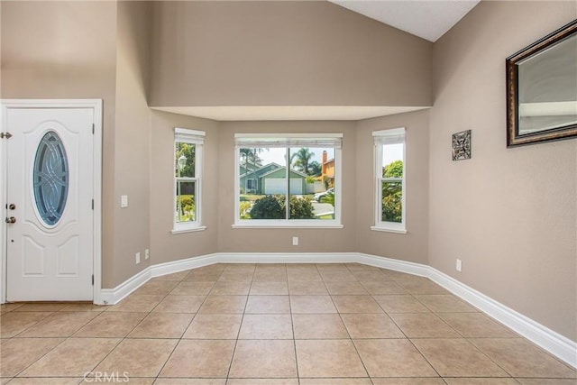 26490 Mapleridge Way, Moreno Valley, CA 92555 - entrance foyer with plenty of natural light, light tile patterned floors, and lofted ceiling