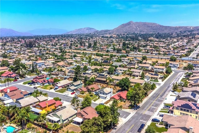 26490 Mapleridge Way, Moreno Valley, CA 92555 - aerial view of property's location featuring a mountain backdrop and nearby suburban area