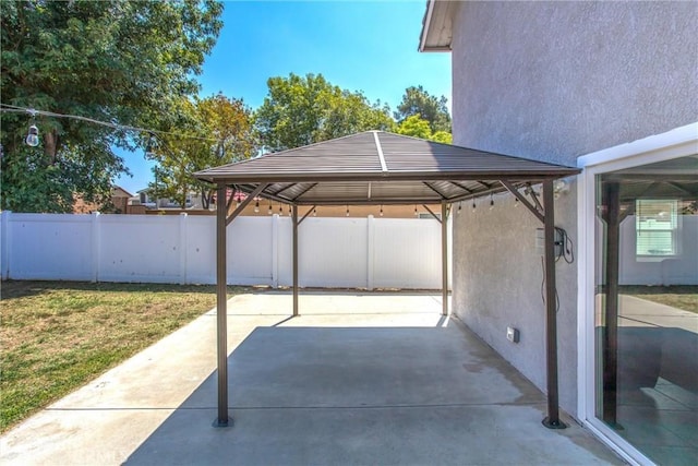 26490 Mapleridge Way, Moreno Valley, CA 92555 - view of patio / terrace with a gazebo, driveway, and a carport