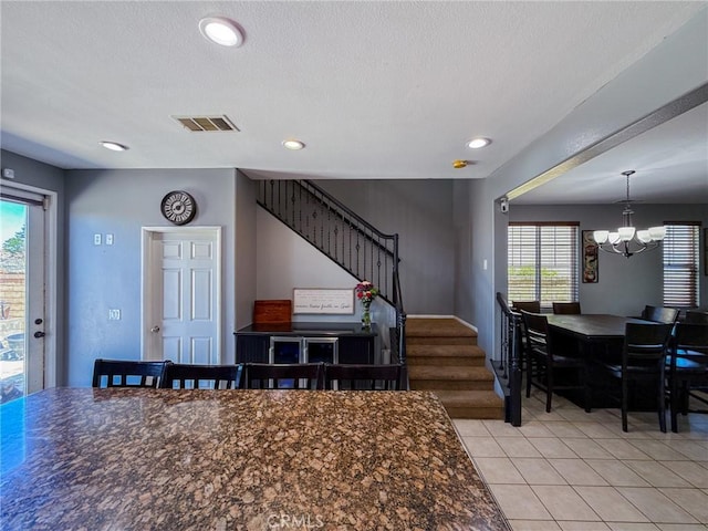2753 Hornbeam Rd, Palmdale, CA 93551 - dining area with a chandelier, stairs, light tile patterned flooring, and recessed lighting