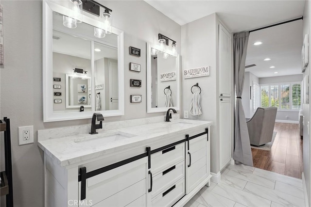 11533 Poppyglen Ct, Moorpark, CA 93021 - full bathroom with double vanity, recessed lighting, and marble finish floors