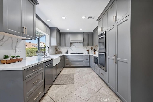 11533 Poppyglen Ct, Moorpark, CA 93021 - kitchen with gray cabinetry, stainless steel appliances, backsplash, and recessed lighting