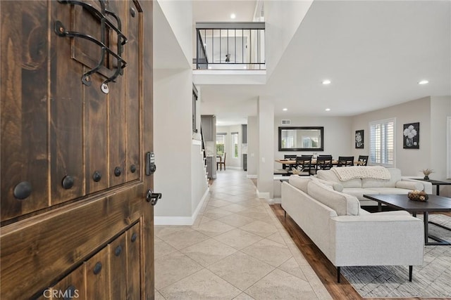 11533 Poppyglen Ct, Moorpark, CA 93021 - living area with plenty of natural light, light tile patterned floors, and recessed lighting