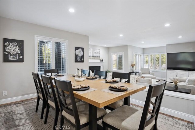 11533 Poppyglen Ct, Moorpark, CA 93021 - dining room with recessed lighting and a fireplace