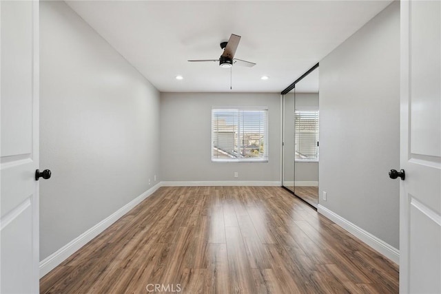 11533 Poppyglen Ct, Moorpark, CA 93021 - unfurnished bedroom with wood finished floors, recessed lighting, and a ceiling fan