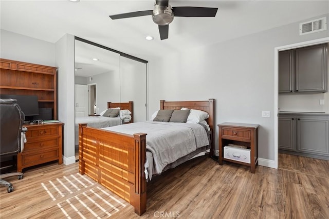 11533 Poppyglen Ct, Moorpark, CA 93021 - bedroom with light wood-type flooring, a closet, ceiling fan, and recessed lighting