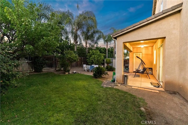 2175 Lester Ave, Clovis, CA 93619 - fenced backyard with a patio area