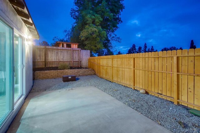 6548 Bantam Lake Cir, San Diego, CA 92119 - fenced backyard with a patio area