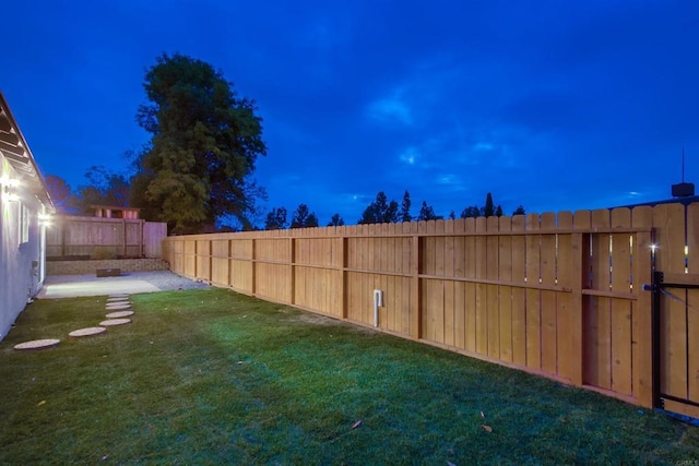6548 Bantam Lake Cir, San Diego, CA 92119 - yard at twilight featuring a fenced backyard and a patio