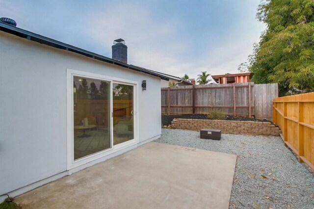 6548 Bantam Lake Cir, San Diego, CA 92119 - fenced backyard with a patio area