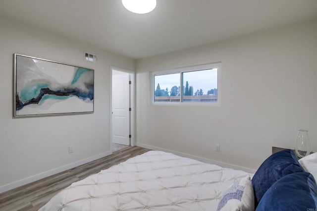 6548 Bantam Lake Cir, San Diego, CA 92119 - bedroom with wood finished floors and baseboards