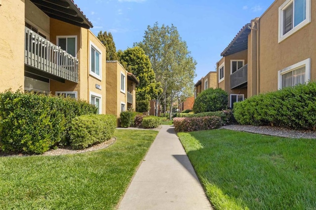 17119 W Bernardo Dr Unit 105, San Diego, CA 92127 - view of home's community with a lawn and a residential view