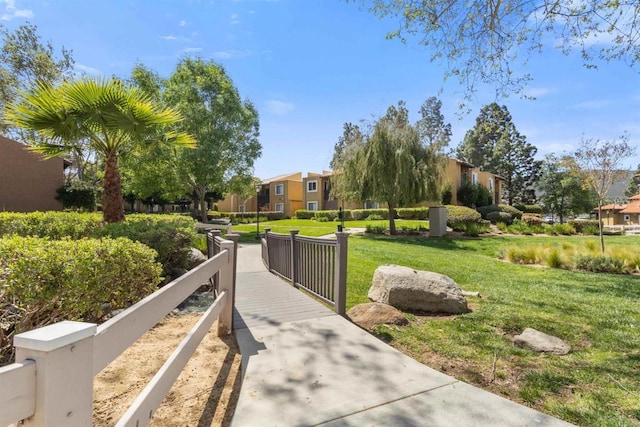 17119 W Bernardo Dr Unit 105, San Diego, CA 92127 - surrounding community with a residential view and a lawn
