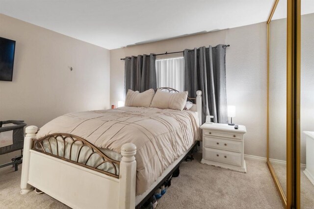17119 W Bernardo Dr Unit 105, San Diego, CA 92127 - carpeted bedroom featuring baseboards
