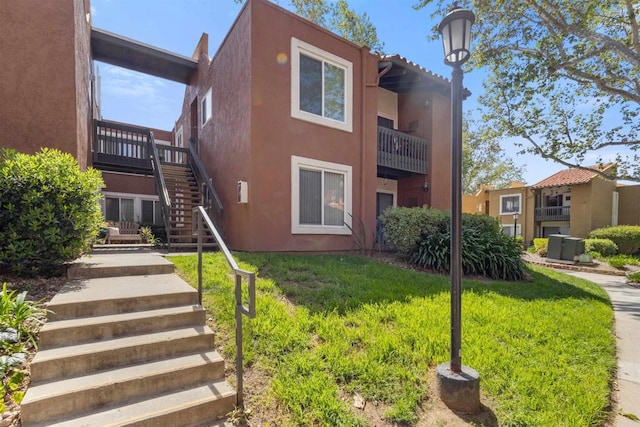 17119 W Bernardo Dr Unit 105, San Diego, CA 92127 - view of building exterior with stairway