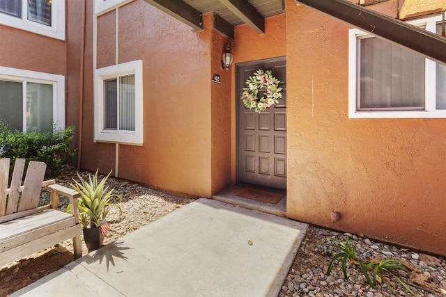 17119 W Bernardo Dr Unit 105, San Diego, CA 92127 - view of exterior entry featuring stucco siding
