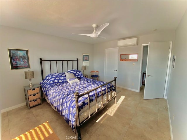 3707 E Livingston Dr Unit 403, Long Beach, CA 90803 - bedroom featuring a wall mounted air conditioner, light tile patterned flooring, and ceiling fan