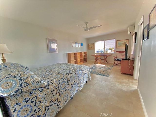 3707 E Livingston Dr Unit 403, Long Beach, CA 90803 - bedroom with an AC wall unit, light tile patterned floors, and ceiling fan