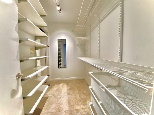 3707 E Livingston Dr Unit 403, Long Beach, CA 90803 - walk in closet with tile patterned flooring