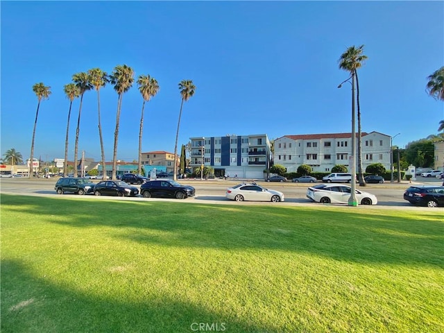 3707 E Livingston Dr Unit 403, Long Beach, CA 90803 - view of property's community with a yard