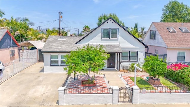 12818 Ramsey Dr, La Mirada, CA 90638 - bungalow featuring a gate, a fenced front yard, stucco siding, a patio area, and driveway