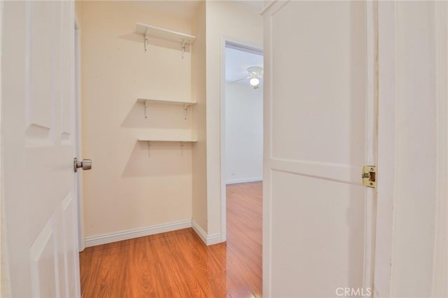 12818 Ramsey Dr, La Mirada, CA 90638 - walk in closet featuring light wood-style flooring