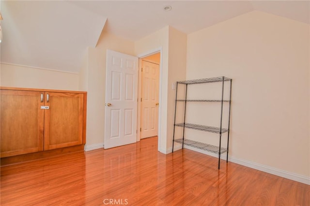 12818 Ramsey Dr, La Mirada, CA 90638 - bonus room featuring light wood finished floors and lofted ceiling