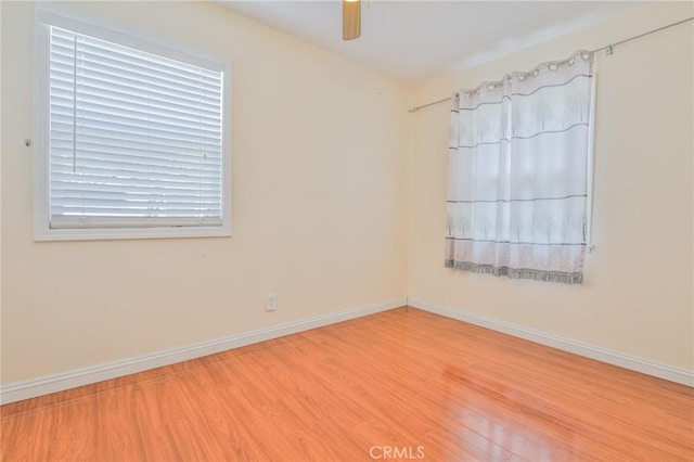 12818 Ramsey Dr, La Mirada, CA 90638 - unfurnished room with wood finished floors and a ceiling fan