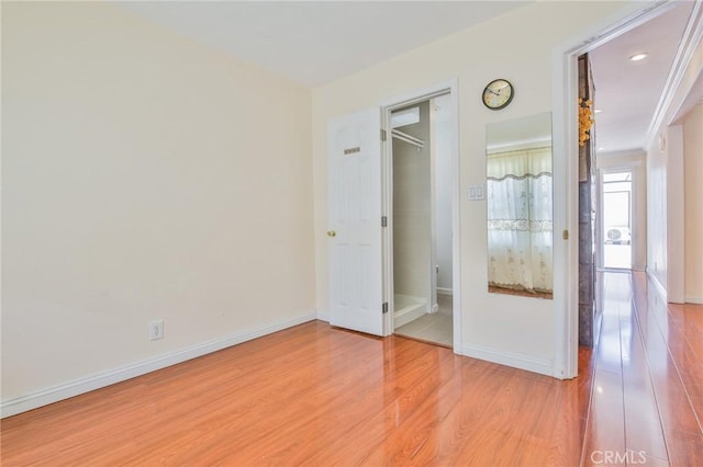 12818 Ramsey Dr, La Mirada, CA 90638 - unfurnished bedroom with light wood-type flooring and recessed lighting